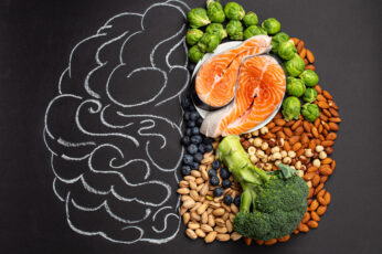 Chalk hand drawn brain with assorted food, food for brain health and